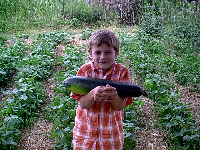 Payton with Giant Zucchini
