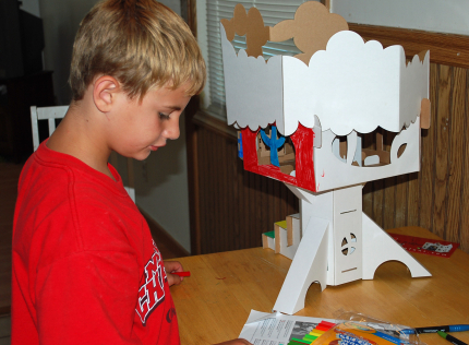 Playing with a Cardboard Tree House